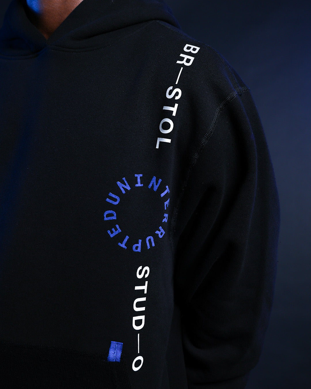 UNINTERRUPTED X Bristol Studio Reversible Hoodie Black - Detail logo