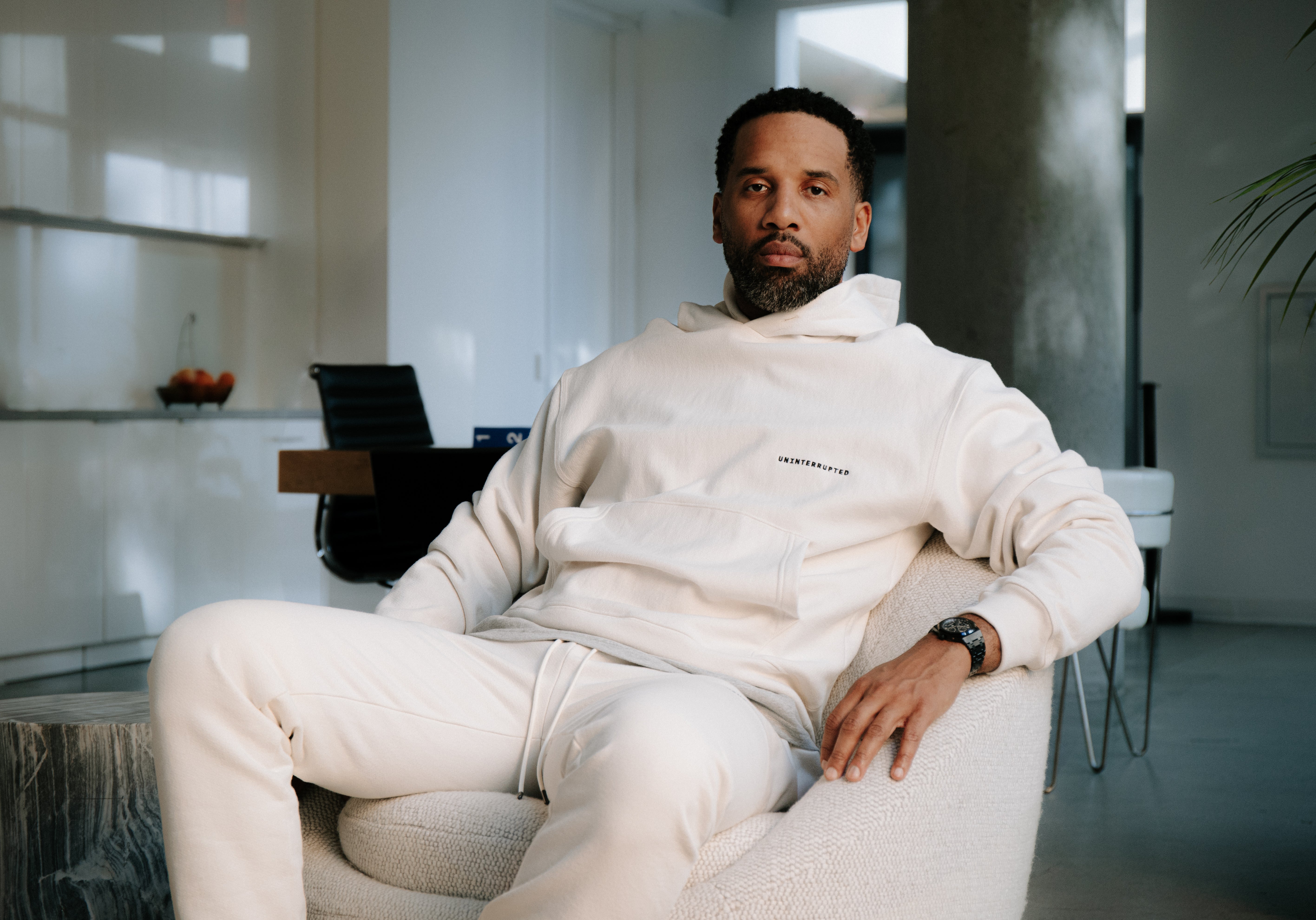 Maverick Carter, Co-Founder, Uninterrupted Wearing Uninterrupted Apparel Fundamentals Sweatshirt and sweatpants.