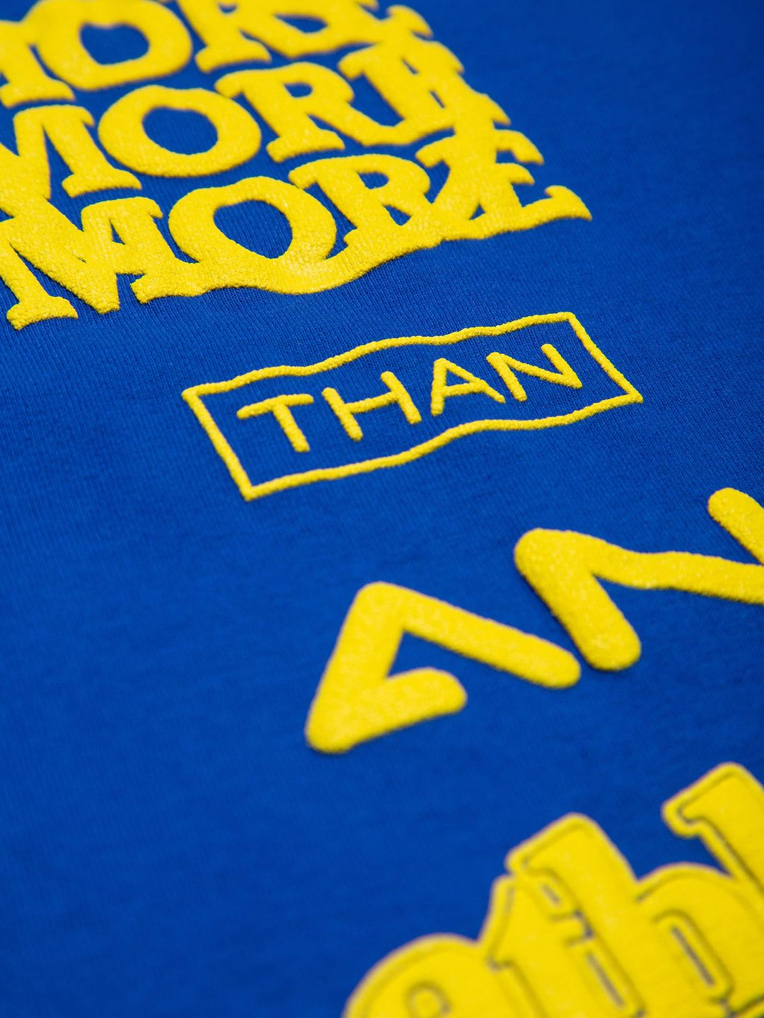 MORE THAN AN ATHLETE ATTRIBUTE TEE BLUE- details
