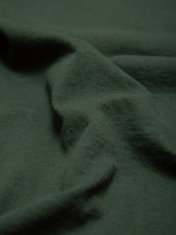 MORE THAN EMPOWERMENT ATTRIBUTE TEE GREEN- detail of fabric