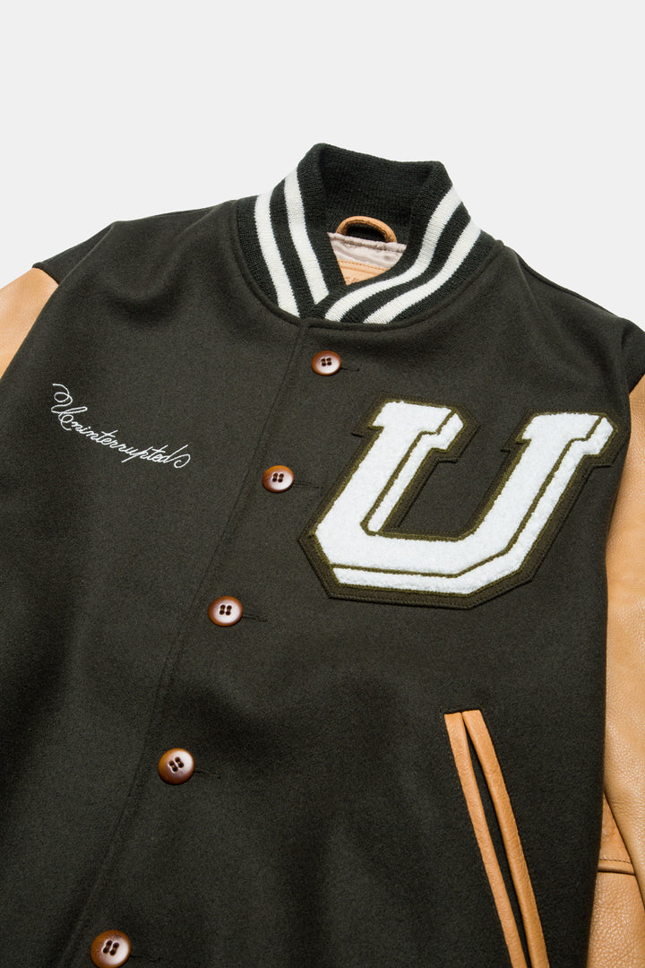 UNINTERRUPTED ALL STAR VARSITY JACKET LODEN GREEN (4458685071440) - close up of the front of the jacket