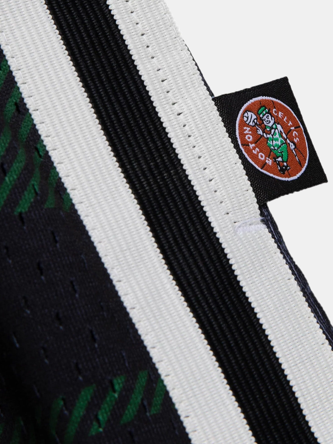 UNINTERRUPTED X Mitchell & Ness Legends Shorts Celtics - close up on the boston celtics tag