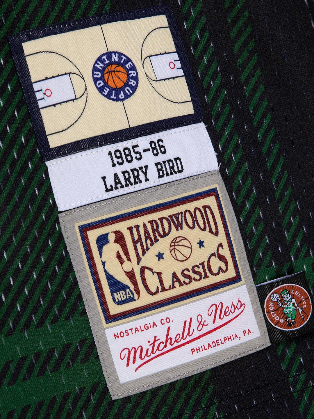 Men's Mitchell & Ness Larry Bird Black Boston Celtics 1985-86 Hardwood Classics Uninterrupted Swingman Jersey