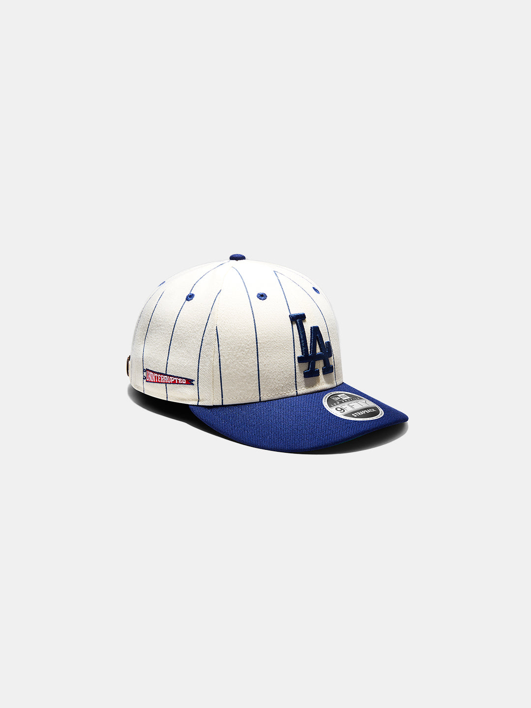 LA Dodgers X UNINTERRUPTED Low Profile 9FIFTY - white and blue striped hat, side view