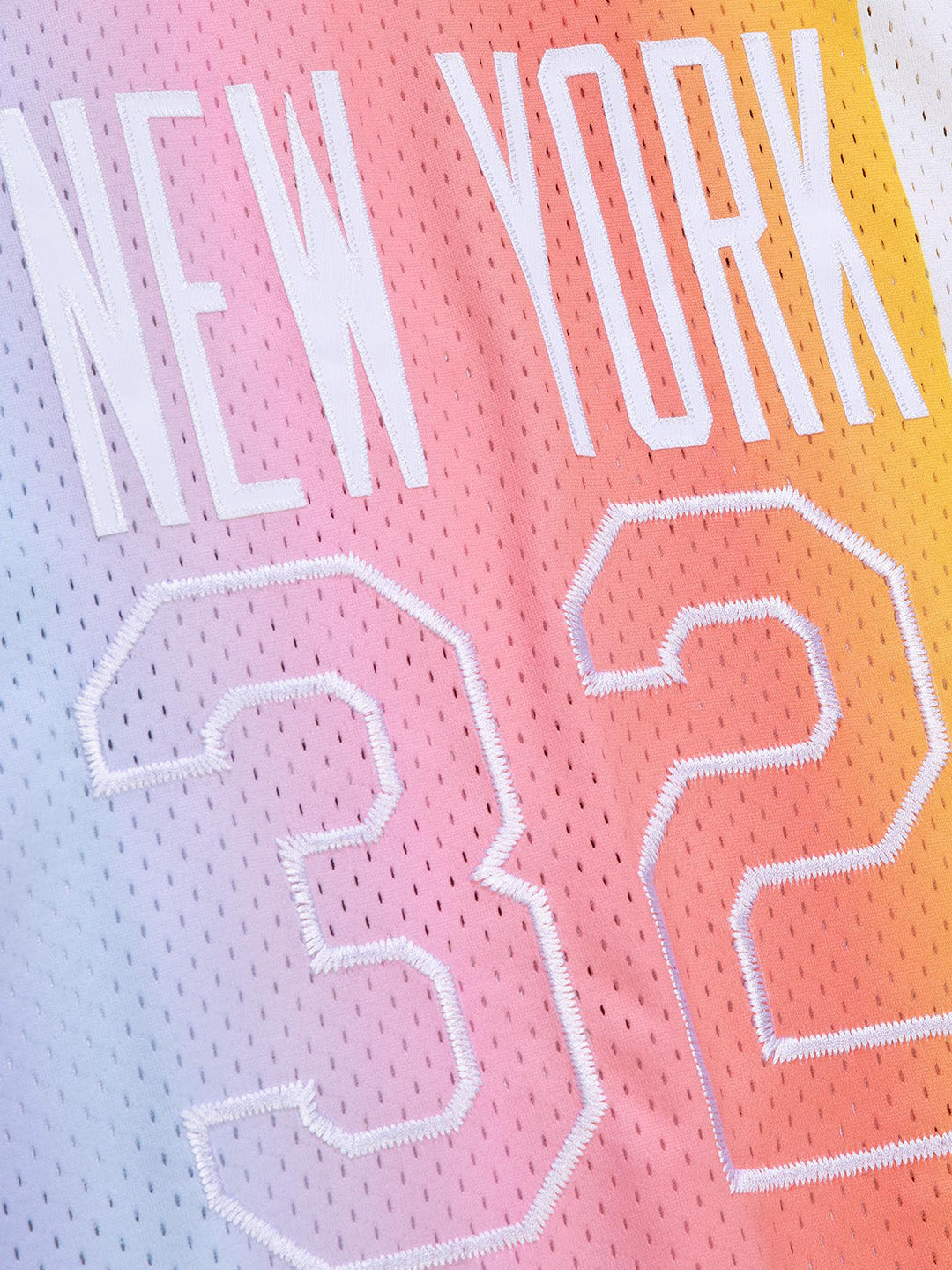 UNINTERRUPTED X Mitchell & Ness Legends Jersey Nets - close up of the number 32 and the "new york"