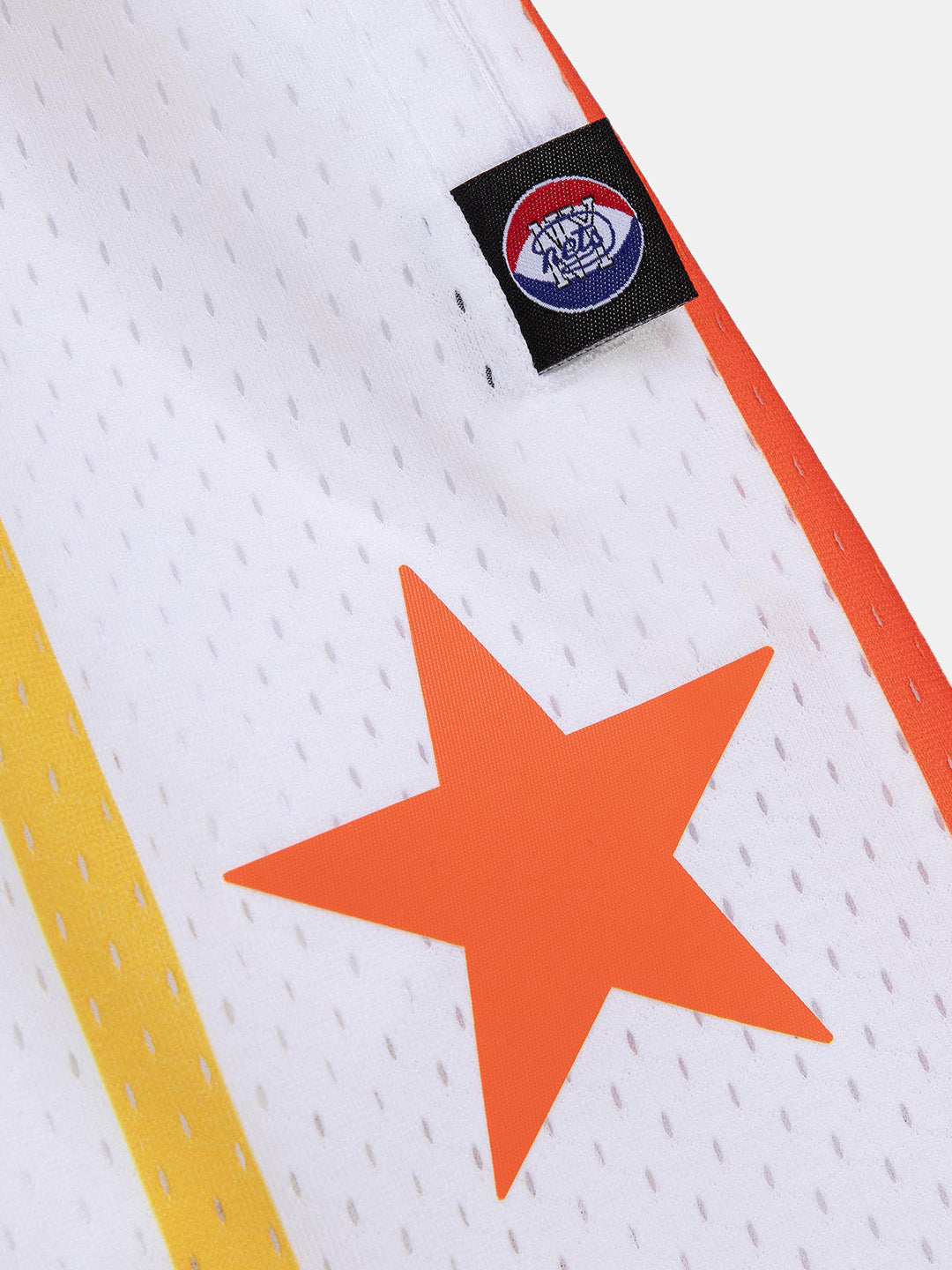 UNINTERRUPTED X Mitchell & Ness Legends Shorts Nets - close up of the stars detail and nets logo tag